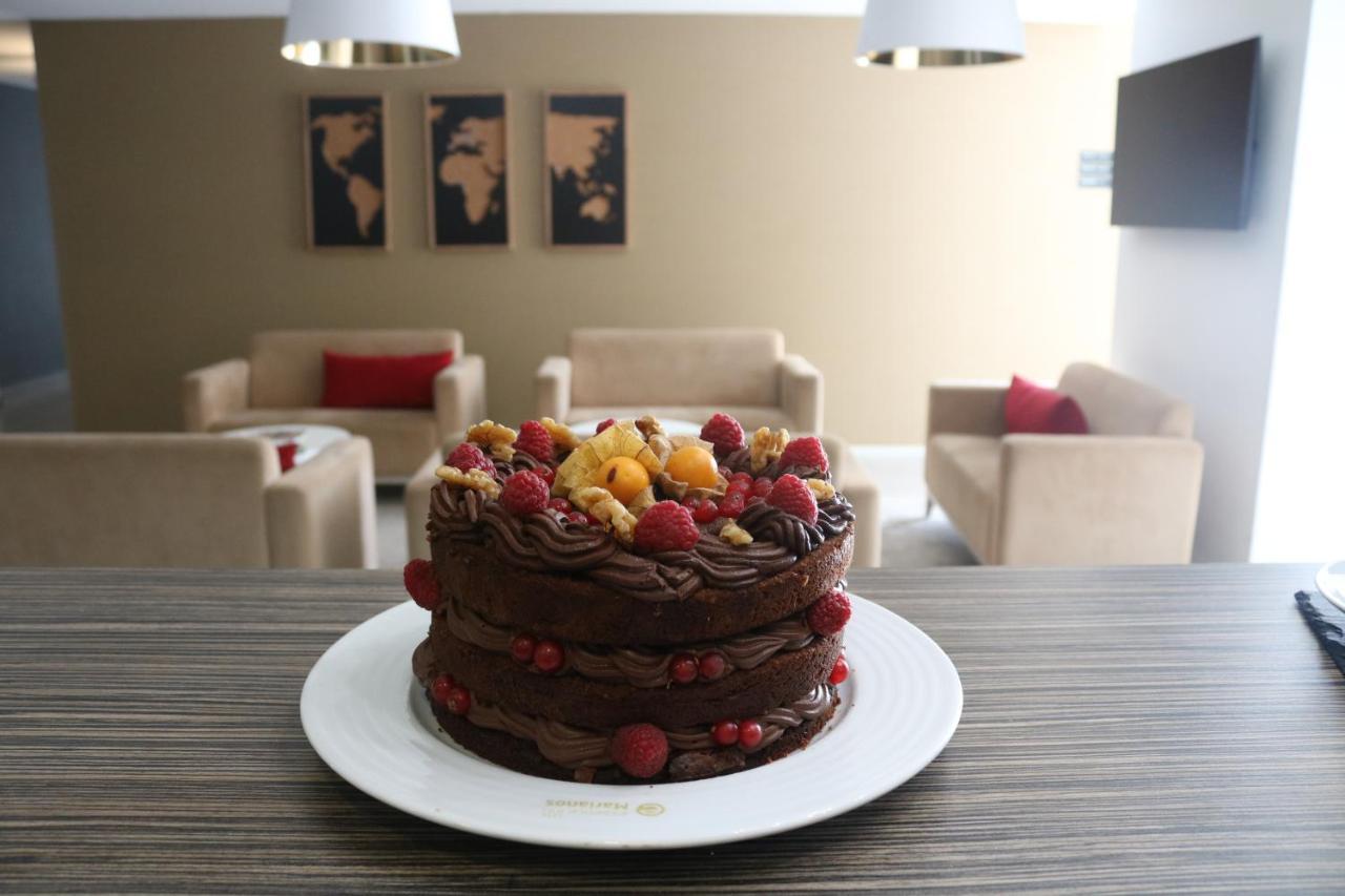 Essence Inn Marianos Hotel Fatima Bagian luar foto